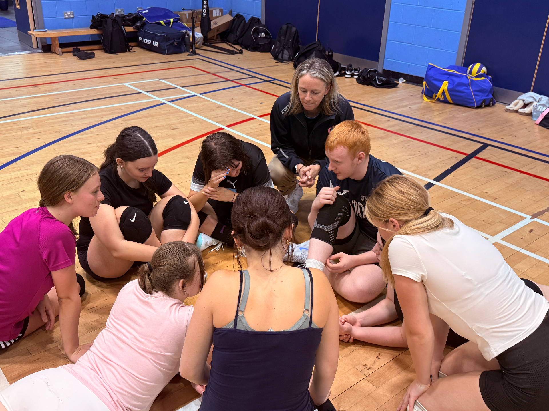 Recreational players in a huddle